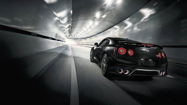 2023 Nissan GT-R seen from behind driving through a tunnel | Ed Martin Nissan of Fishers in Fishers IN