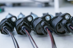 A set of ignition coils set on a table at a service center near Fishers, Indiana.