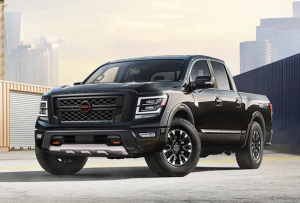 A Nissan Titan parked in a city with the skyline in the background near Fishers, Indiana