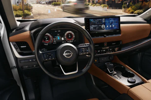 An interior photo of a 2024 Nissan Rogue, parked on a busy street near Fishers, Indiana