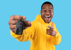 A person showing off the keys to their new car near Fishers, Indiana
