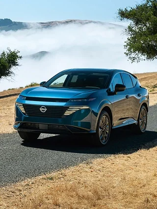 Blue 2026 Nissan Murano on a hillside road