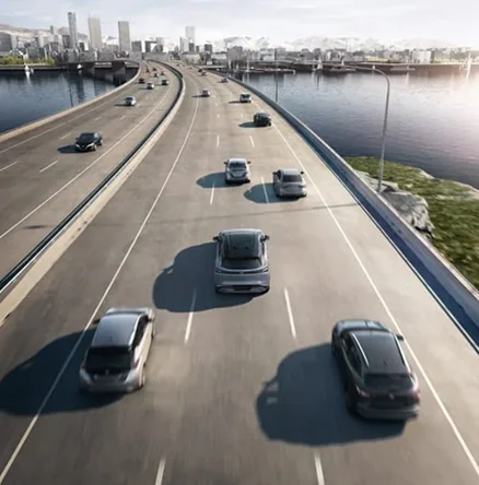 SUVs traveling on a multi-lane freeway
