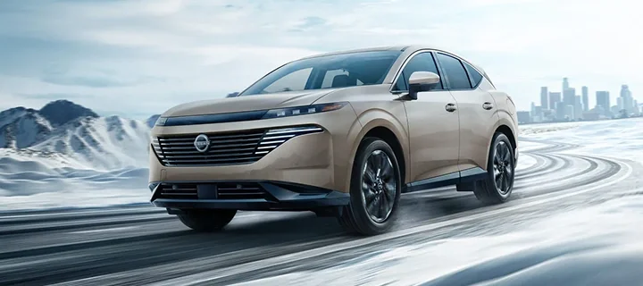 Nissan Murano driving on a snow-covered road